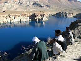 men at lake