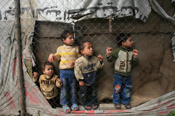 Palestinian children watching