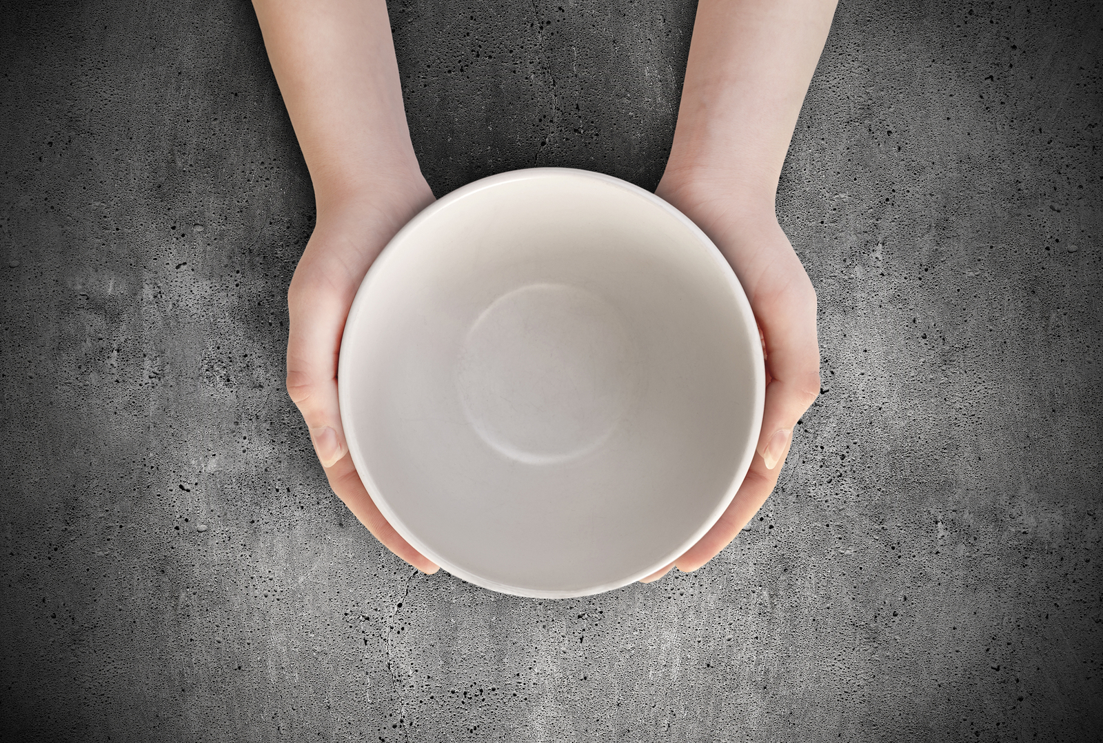 Hunger concept. Female holding empty plate waiting food. Empty plate in hand